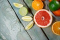 Flat lay of fresh citrus fruits on wooden table Royalty Free Stock Photo