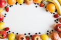 Flat lay with fresh fruits and berries on white background Royalty Free Stock Photo