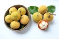 Flat lay fresh sliced santol Sandoricum koetjape fruit in a Wicker basket.the famous fruit Thailand and seasonal fruit