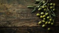 A flat lay of freshly picked olives on a rustic wooden surface Royalty Free Stock Photo