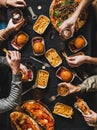 Flat-lay of friends having quarantine home party with fast food