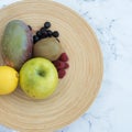 Flat lay of fruiterer with fresh fruits on countertop Royalty Free Stock Photo