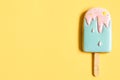 Flat lay gingerbread in the shape of ice cream on yellow background Royalty Free Stock Photo