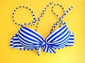 Flat lay girl summer cloth accessorie with blue bikini on y Royalty Free Stock Photo