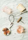 Flat-lay of glass of rose wine, fresh figs and cheese Royalty Free Stock Photo