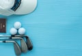 Flat lay : Golf clubs, golf balls, cap, passport Royalty Free Stock Photo