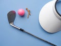 Flat lay of golf equipments on blue background - sport and hobby concept Royalty Free Stock Photo