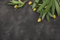 Flat Lay Green Olives With Olive Branch With Leaves On Black Background. Healthy Food. Mediterranean Diet. Poster, Pattern, Food