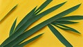 Flat lay green palm leaves over yellow background.