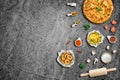 Flat lay Grilled beef steak on wooden cutting board and ingredient. Crispy Onion rings and french fries with sauce. Top view with Royalty Free Stock Photo