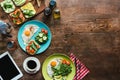 flat lay with healthy breakfast for two with fried eggs, toasts, vegetables and cup of coffee
