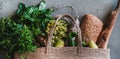 Flat-lay of healthy shopping bag with fresh produce, wide composition