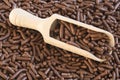 Close up heap chocolate sprinkles, dutch hagelslag in wooden spoon