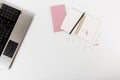 Flat lay home office desk. Mockup with notepad, notebook, paper clips and pencil on white background Royalty Free Stock Photo