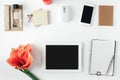 Flat lay feminine workspace tablet notebook smartphone flowers p