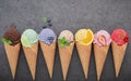 Flat lay ice cream cones collection on dark stone background . Blank crispy ice cream cone with copy space for sweets menu design Royalty Free Stock Photo
