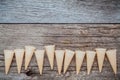 Flat lay ice cream cones collection on shabby wooden background Royalty Free Stock Photo