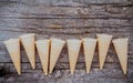Flat lay ice cream cones collection on shabby wooden background Royalty Free Stock Photo