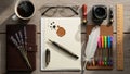 A flat lay image featuring a rustic wooden surface with assorted stationery Royalty Free Stock Photo