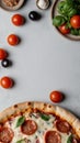 A Pattern of Mini Pepperoni Pizzas With Cherry Tomatoes and Basil Royalty Free Stock Photo