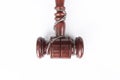 Flat lay of judge gavel tied by chain