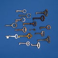 Flat lay of keys. Plenty of decorative, vintage, antique keys for clocks and caskets and doors with unique shapes and