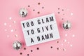 Lightbox with phrase Too glam to give a damn Royalty Free Stock Photo