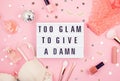 Lightbox with phrase Too glam to give a damn Royalty Free Stock Photo