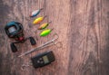 Top down view of various predator fishing tackle and equipment on a wooden floor Royalty Free Stock Photo
