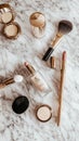 A flat lay of makeup products on a marble surface Royalty Free Stock Photo