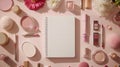 Flat lay of pink makeup products, flowers, and notebook on a pastel background Royalty Free Stock Photo