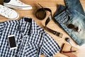 Flat lay of men casual fashion outfits on wooden background