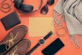 Flat lay of men's accessories with shoes, watch, phone, earphone Royalty Free Stock Photo