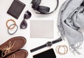Flat lay of men's accessories with shoes, watch, phone, earphone Royalty Free Stock Photo