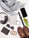 Flat lay of men's accessories with shoes, watch, phone, earphone Royalty Free Stock Photo