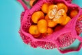 Flat lay Mesh grocery shopping eco friendly tangerine fruits