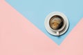 Flat lay of minimalistic picture of coffee on pink and yellow background. Minimalism coffee concept