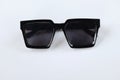 Modern black sunglasses isolate on a white background.Traveler and summer accessories