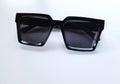 Modern black sunglasses isolate on a white background.Traveler and summer accessories