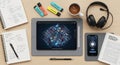 Flat lay of modern desk with notebook tablet headphones and coffee Royalty Free Stock Photo