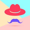 flat lay modern pink hat with mustache icon with shadow on pastel colored blue and pink background Royalty Free Stock Photo