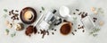Flat lay with Moka pot, espresso cup, ground coffee, milk, sugar and coffee beans on a grey concrete background Royalty Free Stock Photo
