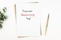 Flat lay national handwriting day mockup with vintage ink pen and paper sheet with sing on white background Royalty Free Stock Photo