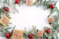 Flat lay new year cristmas boxes, balls and pine tree with snow flakes Royalty Free Stock Photo