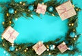 Flat lay new year cristmas craft boxes, balls and pine tree on aqua blue Royalty Free Stock Photo