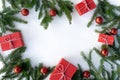 Flat lay new year cristmas red boxes, red balls and pine tree isolated on white Royalty Free Stock Photo