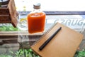 Flat lay of notebook pen and beverage in restaurant