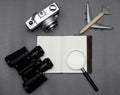 Flat lay of notebook on work desk with camera and telescope Royalty Free Stock Photo