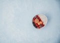 Flat Lay Oatmeal with berries in bowl Royalty Free Stock Photo