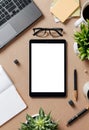 Modern Office Workspace Flat Lay with Tablet Laptop Coffee and Plants Royalty Free Stock Photo